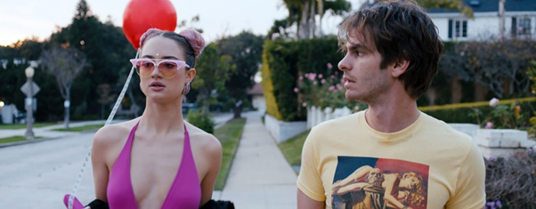 two characters from Under The Silver Lake walking down the streets