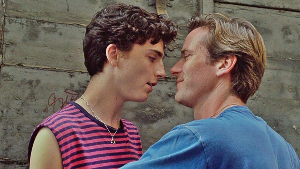 Elio and Oliver look as if they are about to kiss.