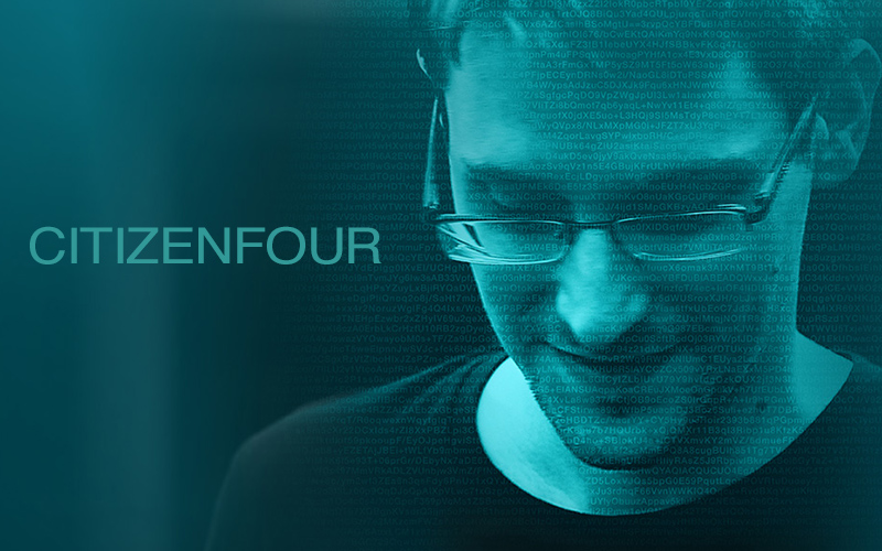 Image is a poster that features a picture of whistleblower Edward Snowden looking down. The image has a blue tinge, and the title of the film "Citizenfour" is in large writing to the left of the image.