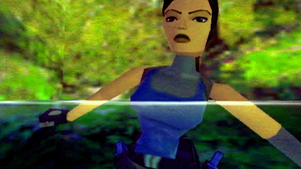Image shows Lara Croft from the game Tomb Raider submerged in water.