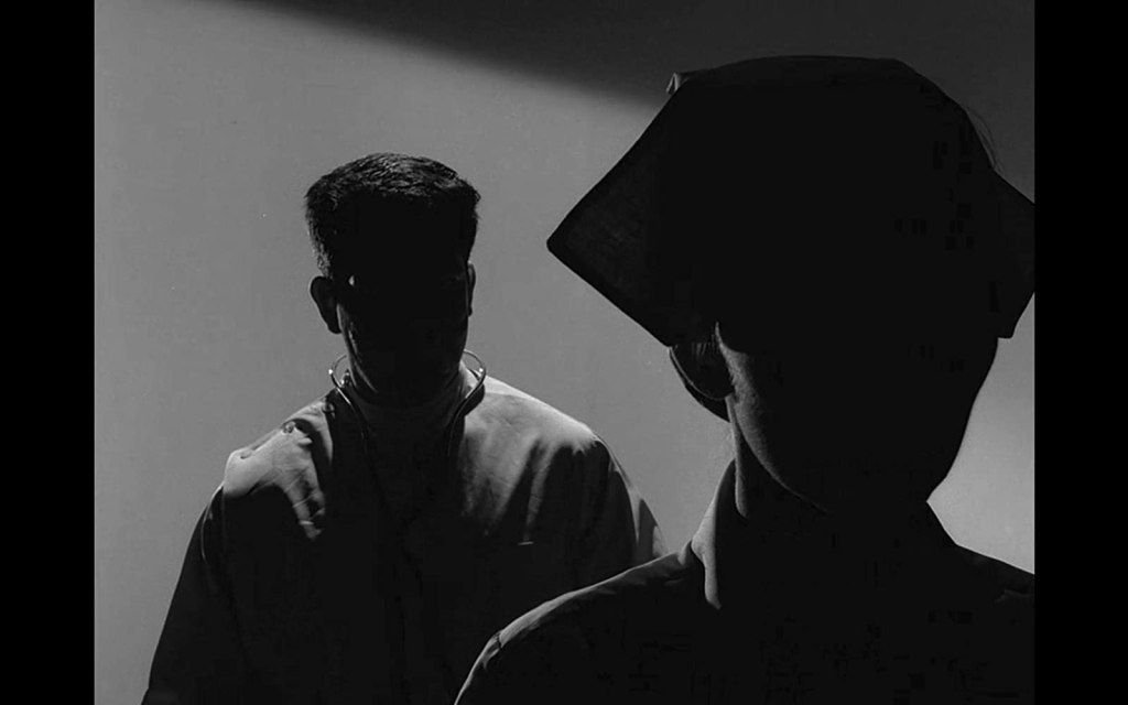 Silhouettes of a doctor and nurse.