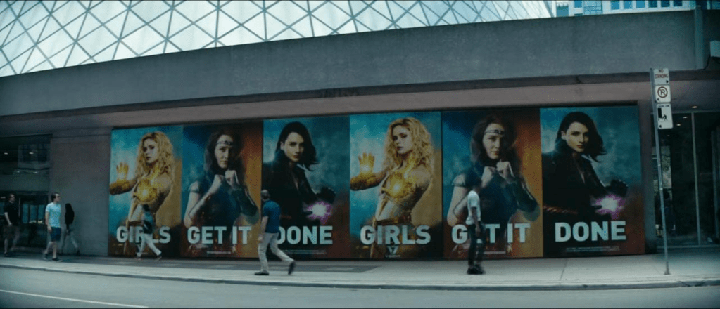 Images of Starlight, Stormfront and Queen Maeve are plastered on the side of a bus stop with the slogan: "Girls Get It Done."
