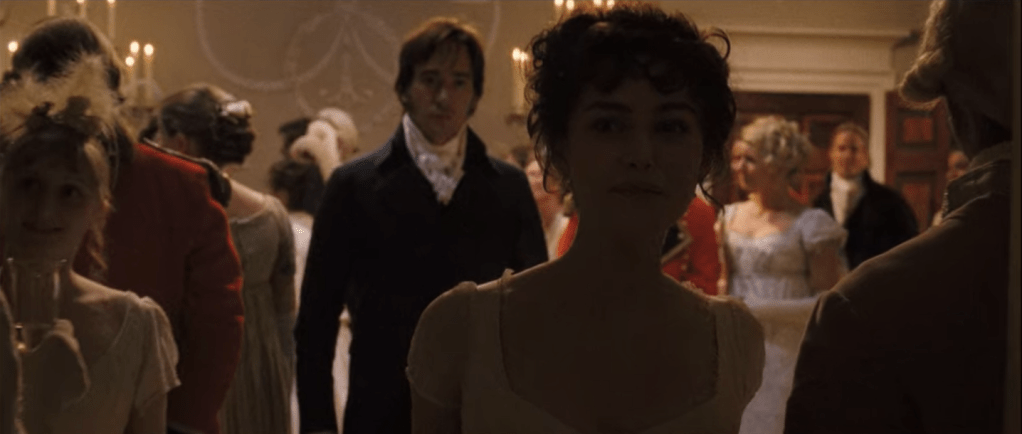 During a ball scene, Darcy follows behind a Elizabeth at a distance. 
