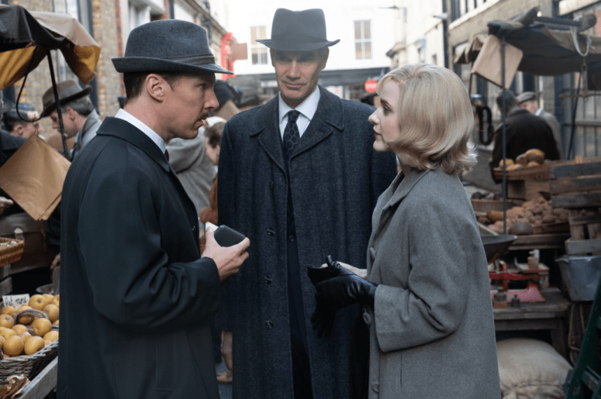Benedict Cumberbatch, Angus Wright, and Rachel Brosnahan having a conversation in the middle of a market