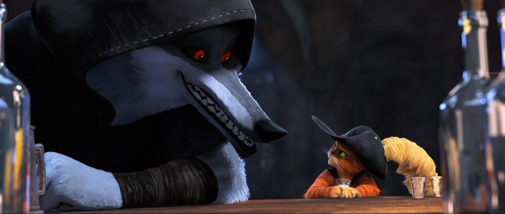 A still from the animated film 'Puss in Boots: The Last Wish' of Puss in Boots and Death, a huge evil-looking wolf in a dark cloak, sitting at a bar together.