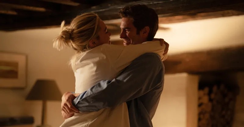 Almut (Florence Pugh) and Tobias (Andrew Garfield) embrace in a still from  the film 'We Live in Time'.
